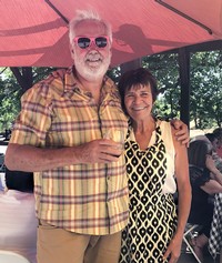 Bill and Jan Smiling with Wine